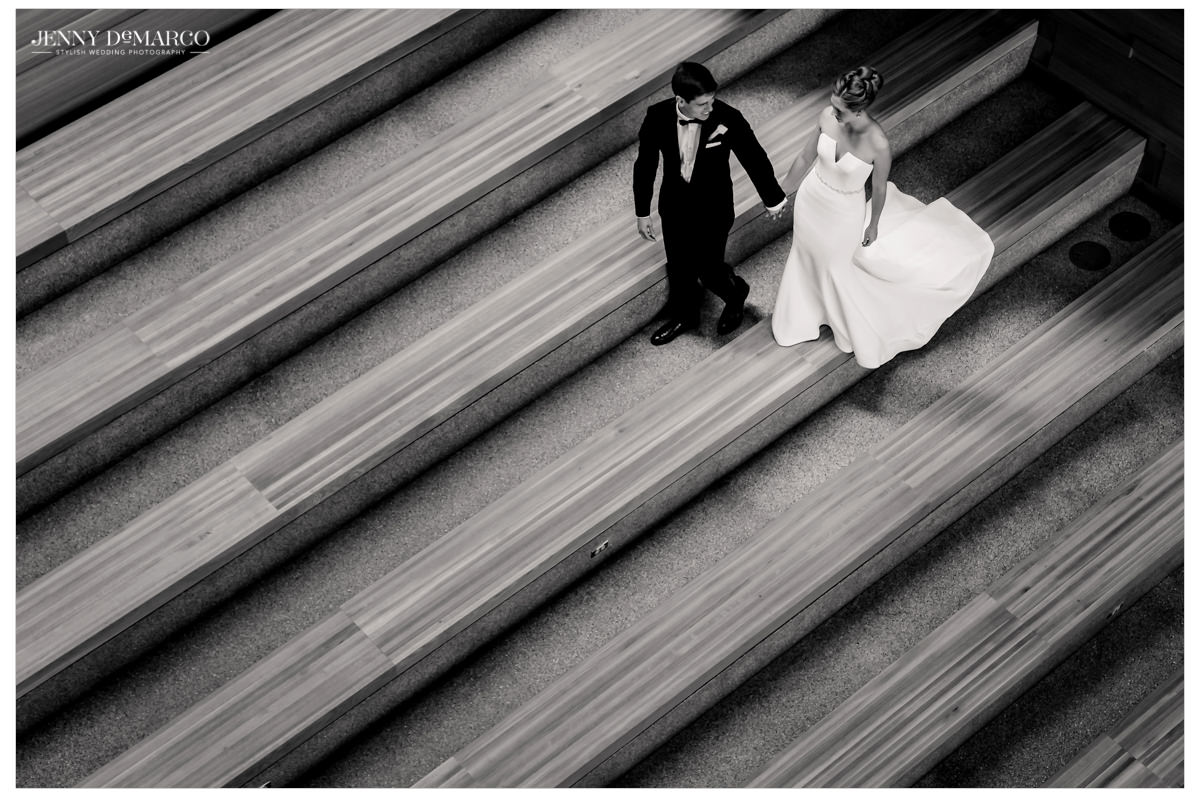 An above shot of the couple on stairs.